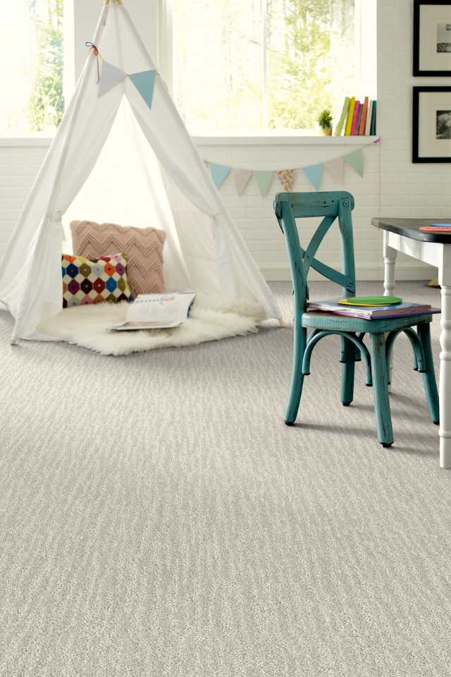 grey patterned carpet in kids room with white popup tent